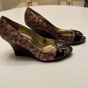 BCBGirls - Brown Signature “BCBG” heels.